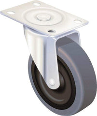 Albion - 3-1/2" Diam x 1-1/4" Wide x 4-1/4" OAH Top Plate Mount Swivel Caster - Rubber, 200 Lb Capacity, Delrin Bearing, 2-1/2 x 3-5/8" Plate - Industrial Tool & Supply