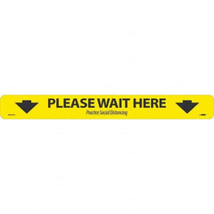 NMC - "Please Wait Here" Adhesive-Backed Floor Sign - Industrial Tool & Supply