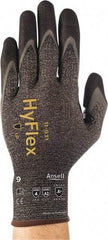 Ansell - Size L (9), ANSI Cut Lvl A2, Abrasion Lvl 4, Nitrile/Polyurethane Coated HPPE Fiber Cut Resistant Gloves - 9.685" Long, Palm & Fingers Coated, Spandex & Dyneema/Nylon Lining, Knit Wrist, Gray/Black, Paired - Industrial Tool & Supply