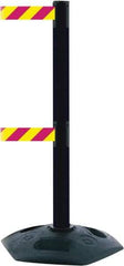 Tensator - 38" High, 2-1/2" Pole Diam, 4 Way Stanchion - 19" Base Diam, Octagon Recycled Rubber Base, Black Plastic Post, 7-1/2' x 2" Tape, Dual Line Tape, For Outdoor Use - Industrial Tool & Supply