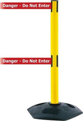 Tensator - 38" High, 2-1/2" Pole Diam, 4 Way Stanchion - 19" Base Diam, Octagon Recycled Rubber Base, Yellow Plastic Post, 7-1/2' x 2" Tape, Dual Line Tape, For Outdoor Use - Industrial Tool & Supply