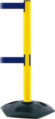 Tensator - 38" High, 2-1/2" Pole Diam, 4 Way Stanchion - 19" Base Diam, Octagon Recycled Rubber Base, Yellow Plastic Post, 7-1/2' x 2" Tape, Dual Line Tape, For Outdoor Use - Industrial Tool & Supply