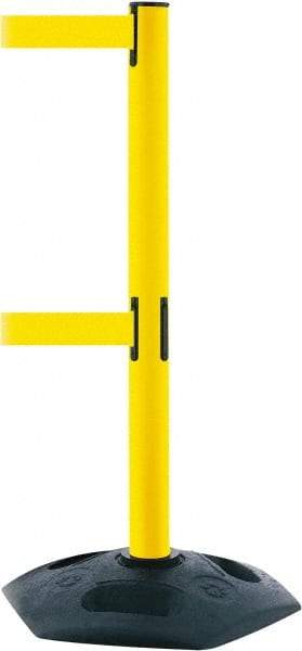 Tensator - 38" High, 2-1/2" Pole Diam, 4 Way Stanchion - 19" Base Diam, Octagon Recycled Rubber Base, Yellow Plastic Post, 7-1/2' x 2" Tape, Dual Line Tape, For Outdoor Use - Industrial Tool & Supply