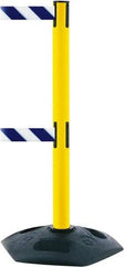 Tensator - 38" High, 2-1/2" Pole Diam, 4 Way Stanchion - 19" Base Diam, Octagon Recycled Rubber Base, Yellow Plastic Post, 13' x 2" Tape, Dual Line Tape, For Outdoor Use - Industrial Tool & Supply