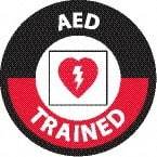 NMC - AED Trained, Hard Hat Label - Round, White & Red on Black, 0.004" Thick, Indoor or Outdoor, Adhesive Backed, For Accident Prevention - Industrial Tool & Supply