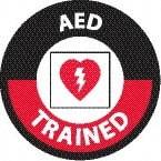 NMC - AED Trained, Hard Hat Label - Round, White & Red on Black, 0.004" Thick, Indoor or Outdoor, Adhesive Backed, For Accident Prevention - Industrial Tool & Supply