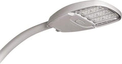 Philips - 108 Watt LED Roadway Light - Clear Polycarbonate Lens, Arm Mount & Bracket, 120 to 277 Volts, IP66 Ingress Protection, 23-1/2" Long x 4.38" High x 11" Wide - Industrial Tool & Supply