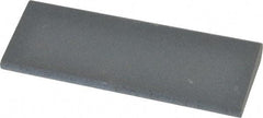 Norton - 4-1/2" Long x 1-3/4" Diam x 1/2" Thick, Silicon Carbide Sharpening Stone - Round, Fine Grade - Industrial Tool & Supply