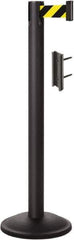 Lavi Industries - 38-1/2" High, 2-3/4" Pole Diam, Stanchion - 12-1/2" Base Diam, Round Steel Base, Black Steel Post, 7' x 2" Tape, Single Line Tape - Industrial Tool & Supply