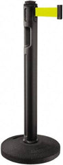 Lavi Industries - 38-1/4" High, 3-1/4" Pole Diam, Stanchion - 16" Base Diam, Dome Recycled Rubber Base, Black Plastic Post, 12' x 2" Tape, Single Line Tape, For Outdoor Use - Industrial Tool & Supply