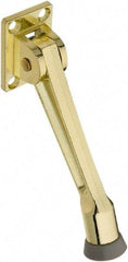 National Mfg. - 5" Projection Kickdown Door Stop - Screw Mount, Brass Finish - Industrial Tool & Supply