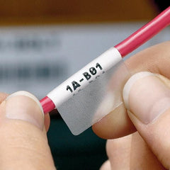 Panduit - 1-1/4" Wide x 1" Long, Clear/White Vinyl Cartridge For Self-Laminating Labels - For LS8EQ, LS8E, Hand-Held Thermal Transfer Printer - Industrial Tool & Supply