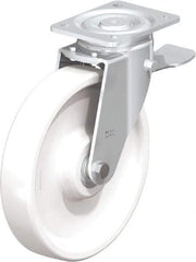 Blickle - 10" Diam x 1-31/32" Wide x 11-39/64" OAH Top Plate Mount Swivel Caster with Brake - Impact-Resistant Nylon, 1,980 Lb Capacity, Ball Bearing, 5-1/2 x 4-3/8" Plate - Industrial Tool & Supply