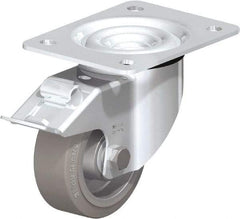 Blickle - 4" Diam x 1-37/64" Wide x 5-7/64" OAH Top Plate Mount Swivel Caster with Brake - Solid Rubber, 440 Lb Capacity, Ball Bearing, 5-1/2 x 4-3/8" Plate - Industrial Tool & Supply