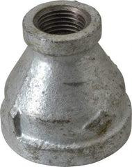 B&K Mueller - Class 150, 1-1/4 x 1/2" Galvanized Pipe Reducing Coupling - Threaded, Malleable Iron - Industrial Tool & Supply