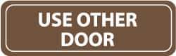 NMC - Use Other Door, 11" Wide x 3.5" High, Acrylic Sign - English, White on Brown, Wall Mount - Industrial Tool & Supply