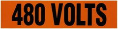 NMC - Electrical Markers Label - Legend: 600 Volts, English, Black & Orange, 4-1/2" Long x 1-1/8" High, Sign Muscle Finish - Industrial Tool & Supply