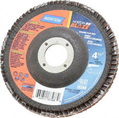 Norton - 60 Grit, 4-1/2" Disc Diam, 7/8" Center Hole, Type 29 Ceramic Flap Disc - 13,000 Max RPM, Fiberglass Backing, Arbor Attaching System, Coated - Industrial Tool & Supply