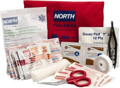 North - 39 Piece, 10 Person, Multipurpose/Auto/Travel First Aid Kit - 4-1/2" Wide x 1-1/2" Deep x 7" High, Nylon Bag - Industrial Tool & Supply